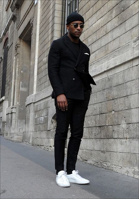 black suit white shoes