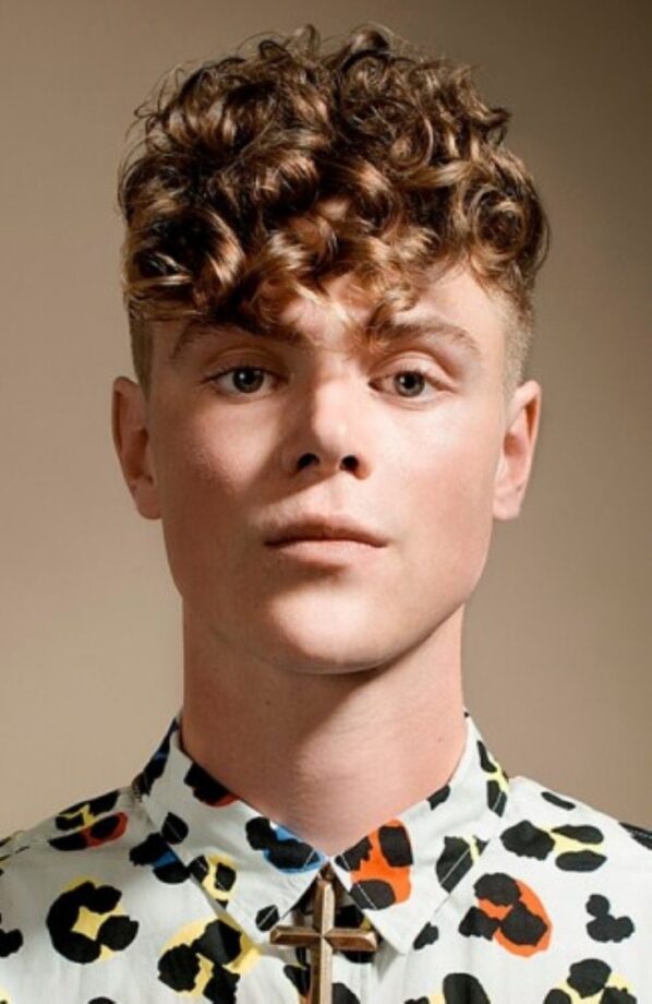 40 Ultra Cool Curly Taper Fade Haircuts for Men in 2024