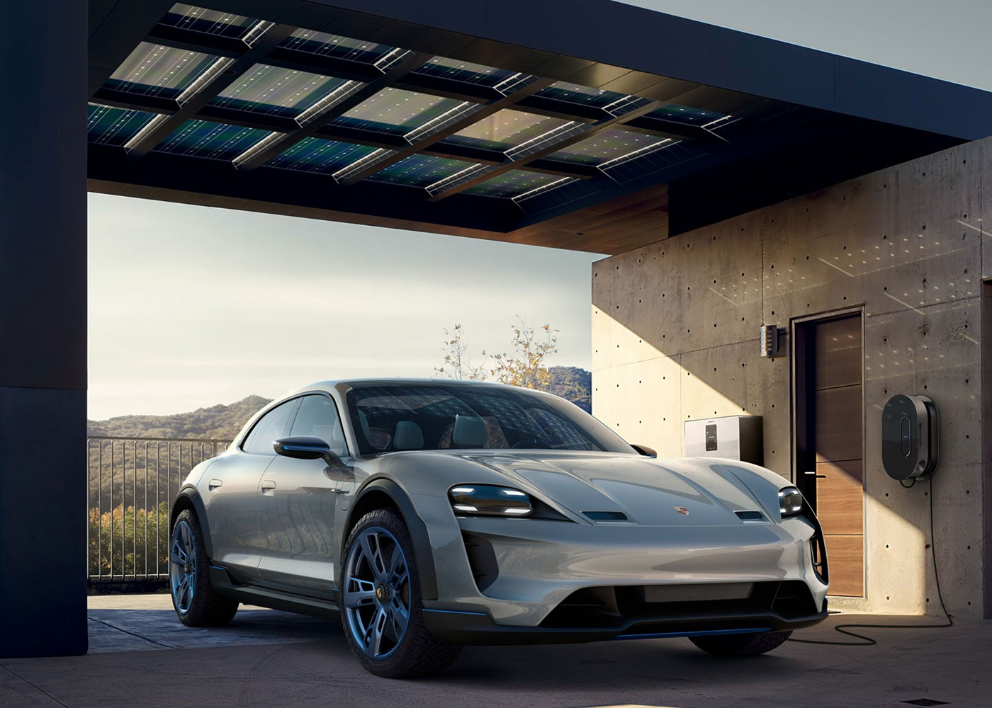 Porsche Mission E near solar-covered carport, charging.