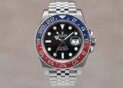 Rolex GMT-Master II: Red-blue bezel, Jubilee bracelet.