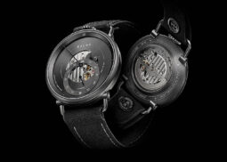 Two Baume watches with visible movements displayed.