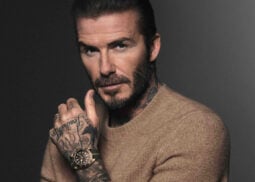 Tattooed man showcases Tudor watch for campaign.