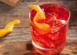 Non-alcoholic red cocktail with an orange twist.