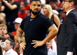 Man in black T-shirt with Richard Mille watch.