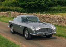 Aston Martin DB5 parked on rural Australian road.