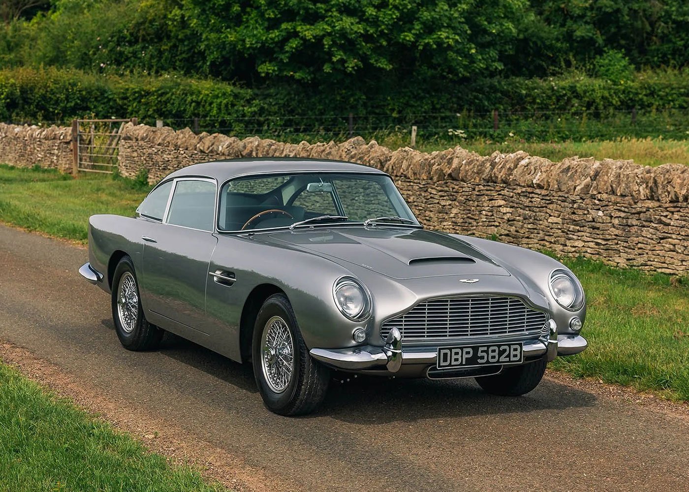 Aston Martin DB5 parked on rural Australian road.