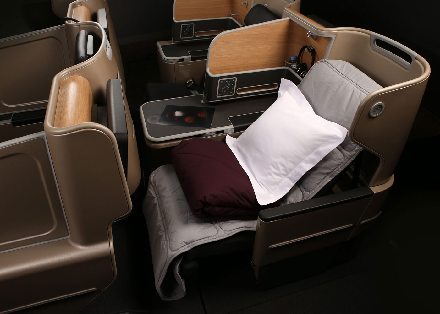 Qantas A330 Business Class: Luxurious reclining bed suite.