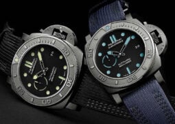 Two Panerai Submersible watches on display.