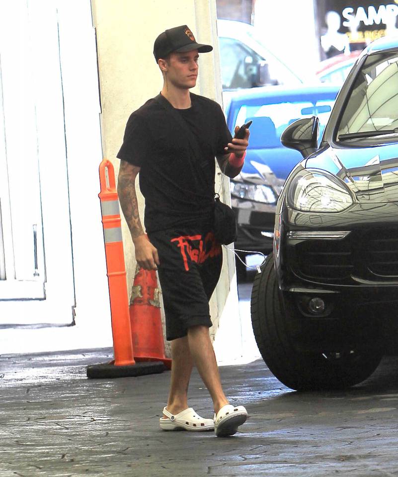 Justin Bieber Spots All-Red Look Complete with Favorite Huaraches –  Footwear News