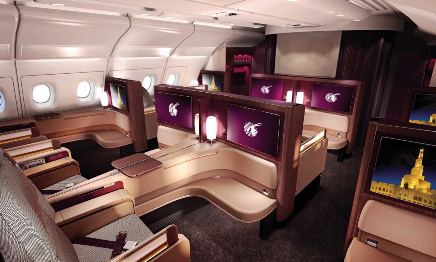 Luxury airplane cabin offers spacious, elegant suites.