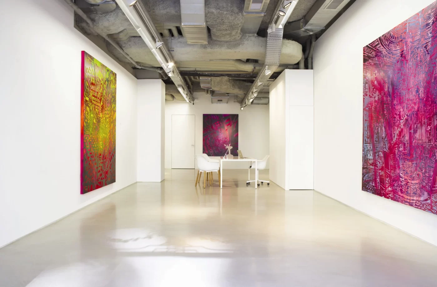 Contemporary art gallery resembles a luxurious Paris hotel.
