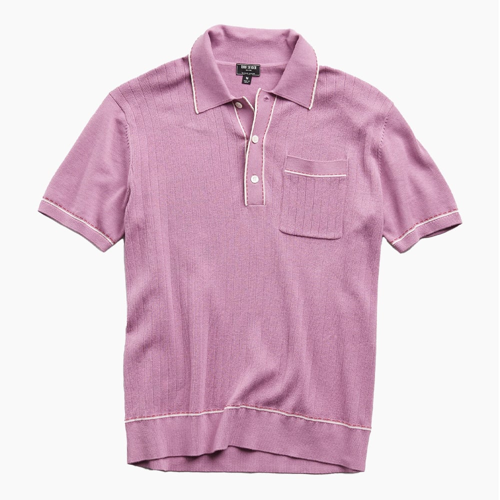 Purple polo shirt with pocket.