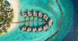 Nautilus Maldives: overwater bungalows, beach.