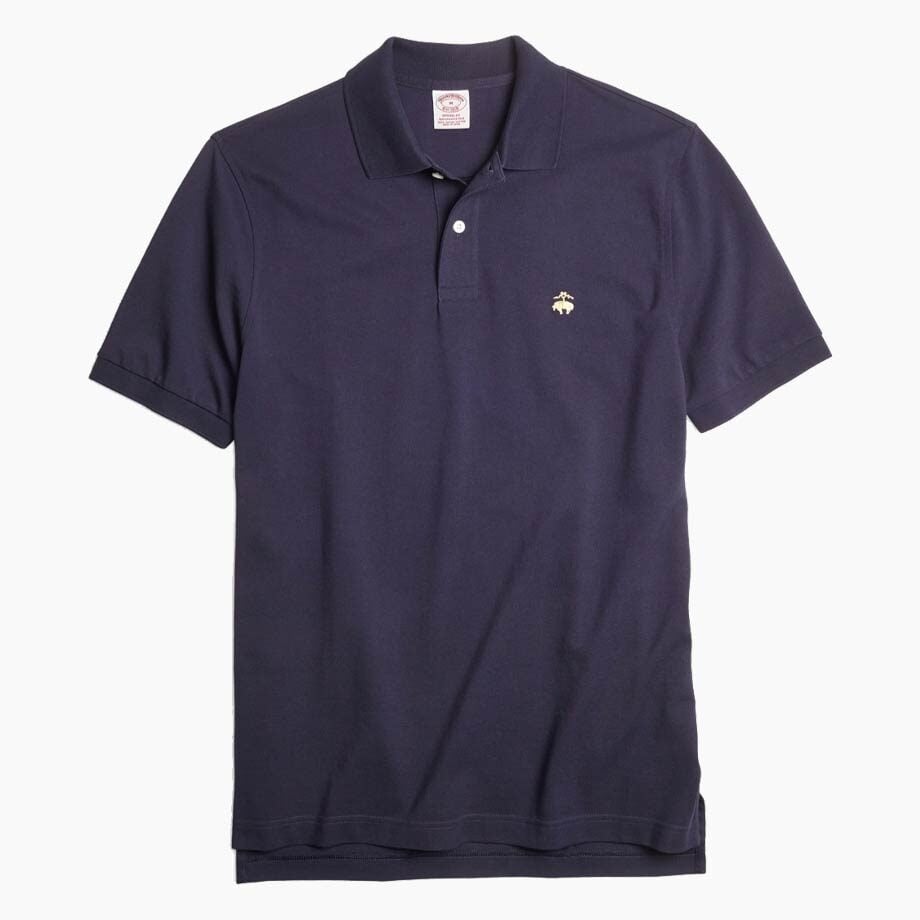 Dark blue polo, embroidered logo, buttoned collar.