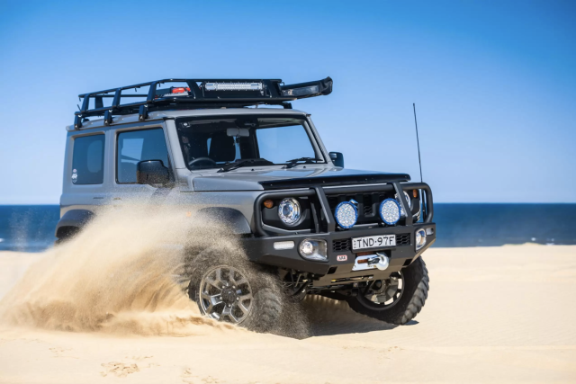 Suzuki Jimny 4WD effortlessly navigates sand dunes.