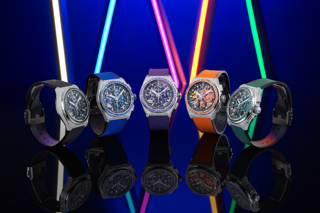 Five luxury watches with vibrant neon displays.