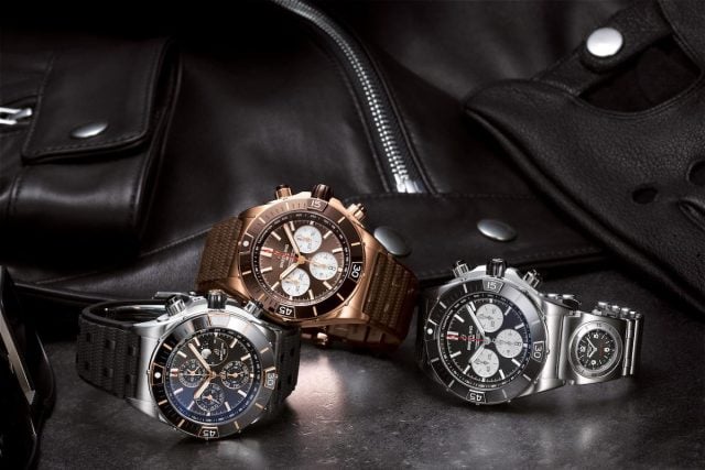 Three luxury watches and a leather jacket.