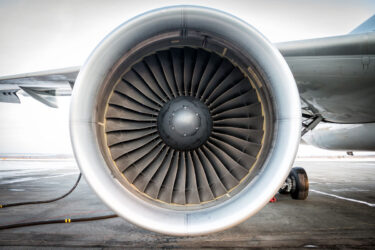 Close-up of aircraft engine during maintenance.