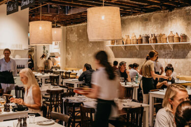 Diners enjoy Totti's lively, vibrant atmosphere.