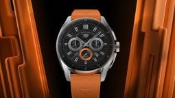 TAG Heuer watch with bold orange accents.