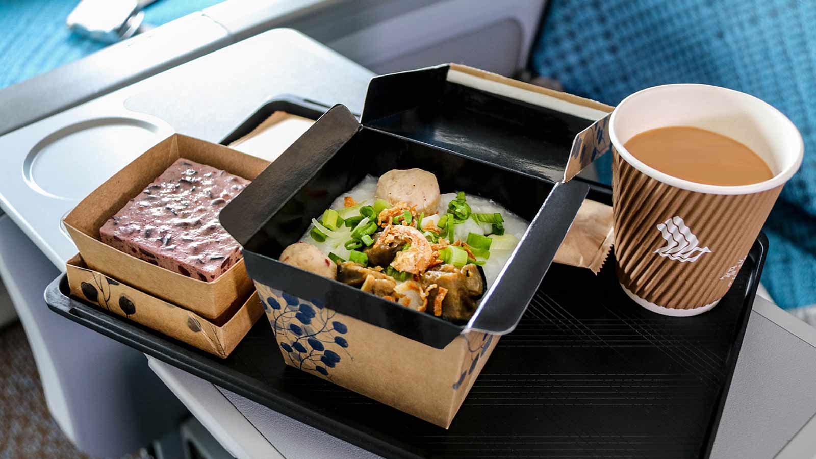 Airline meal beautifully prepared with savory dishes.