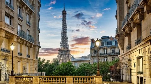 Eiffel Tower seen between two Parisian apartments.