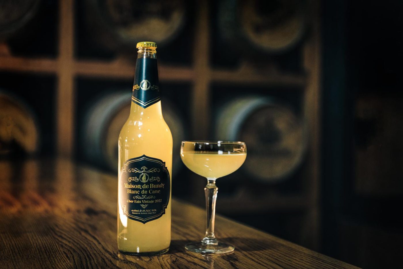 Maison De Brutes bottle exudes elegance, rustic setting.