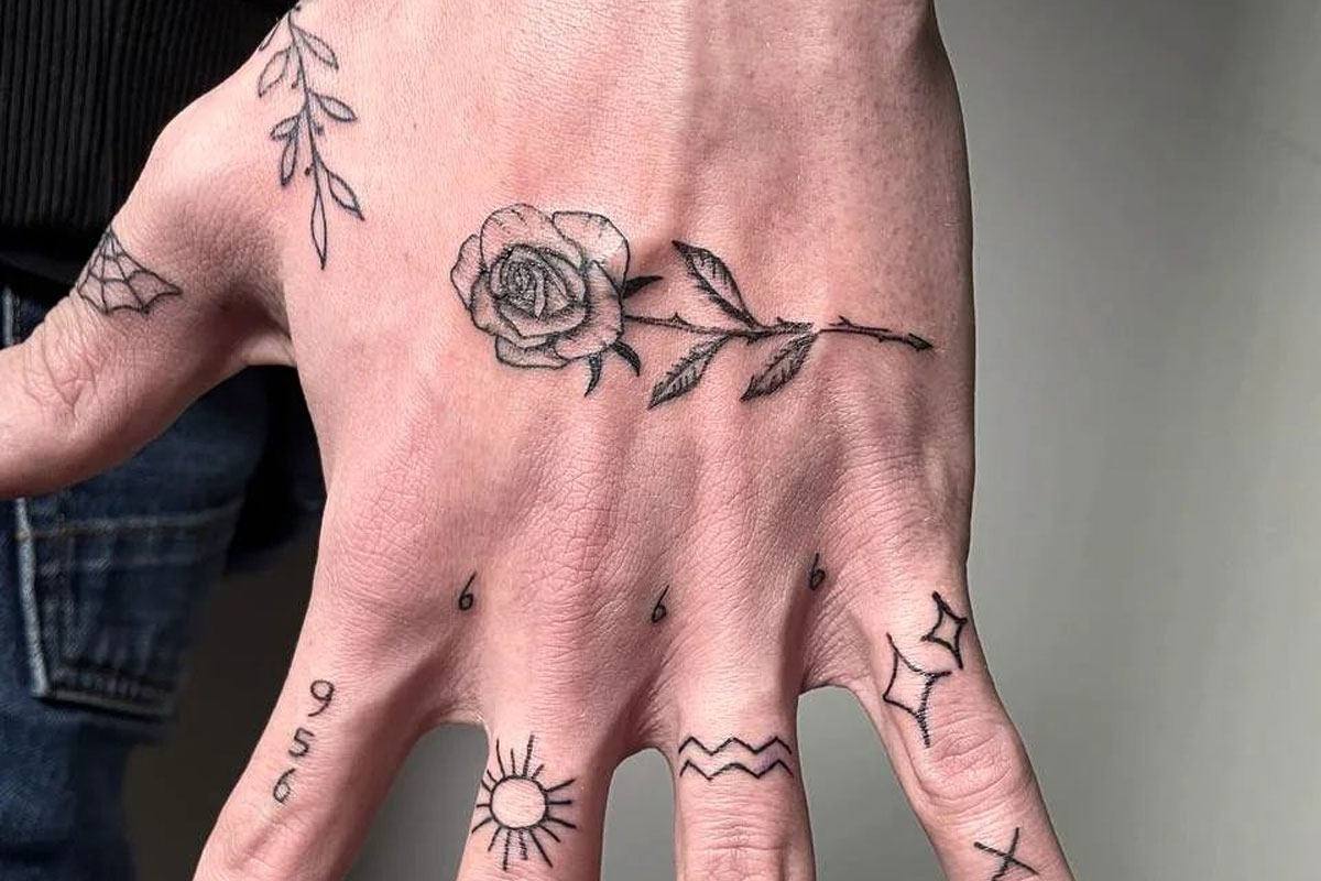 Tattoo uploaded by rcallejatattoo  Neotraditional Rose hand tattoo   Tattoodo