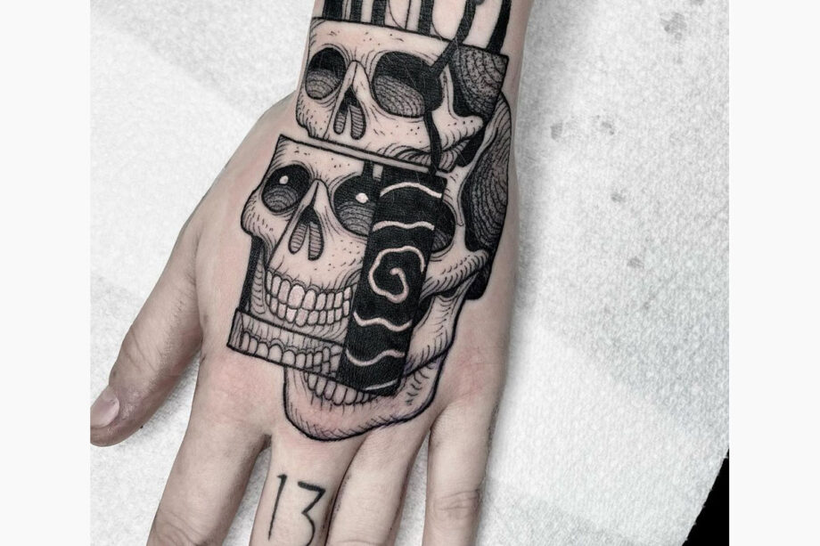 30 Cool Skeleton Hand Tattoos