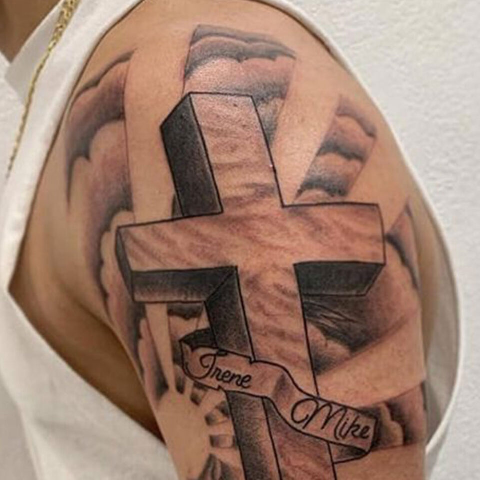 cross tattoos for girls on shoulder