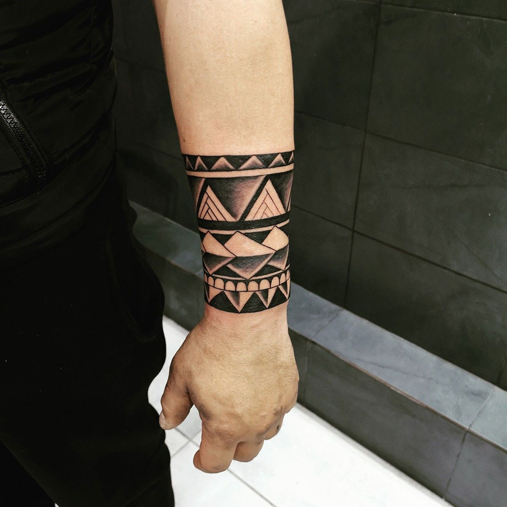 thin wrap around forearm tattoos