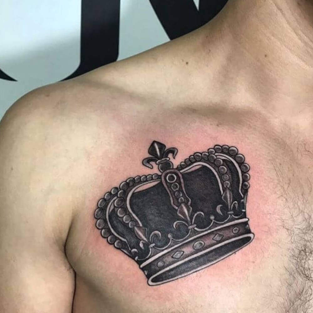 Black King Crown Tattoo On Man Chest