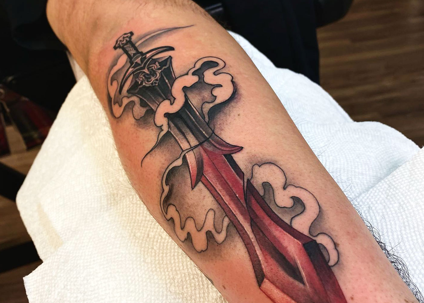 skull and swords tattoo