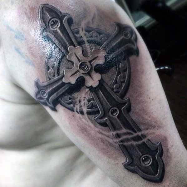 Cross with Intricate Engravings Realism Tattoo Source: @nextluxury via Pinterest