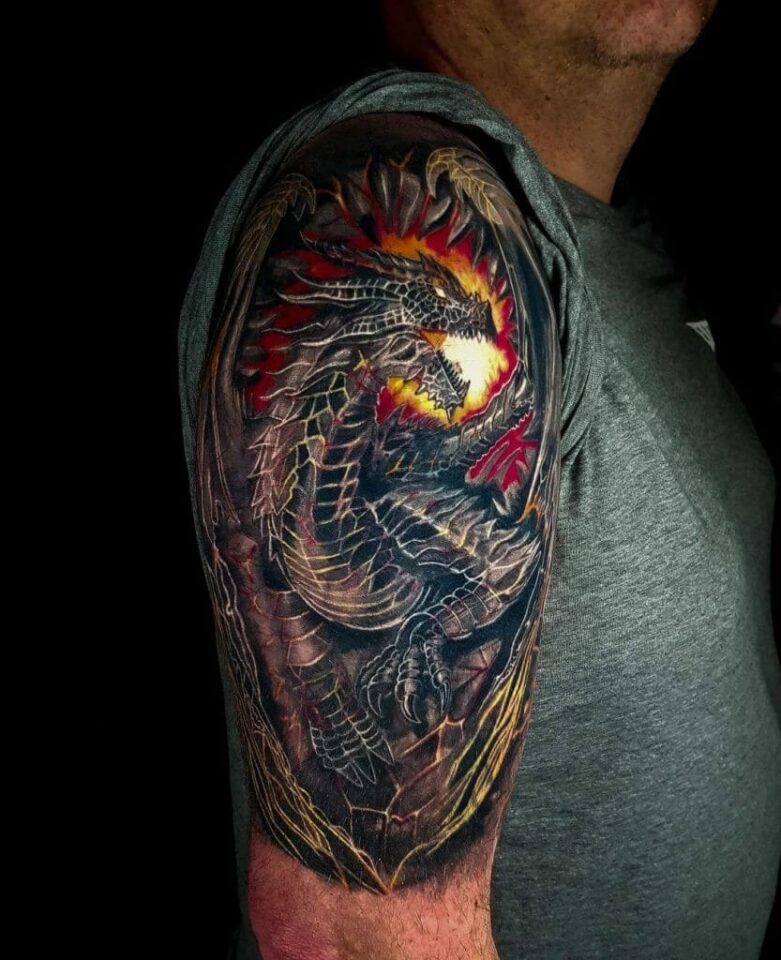 Fire-breathing Dragon Realism Tattoo Source @interstellarinktattoos via Instagram
