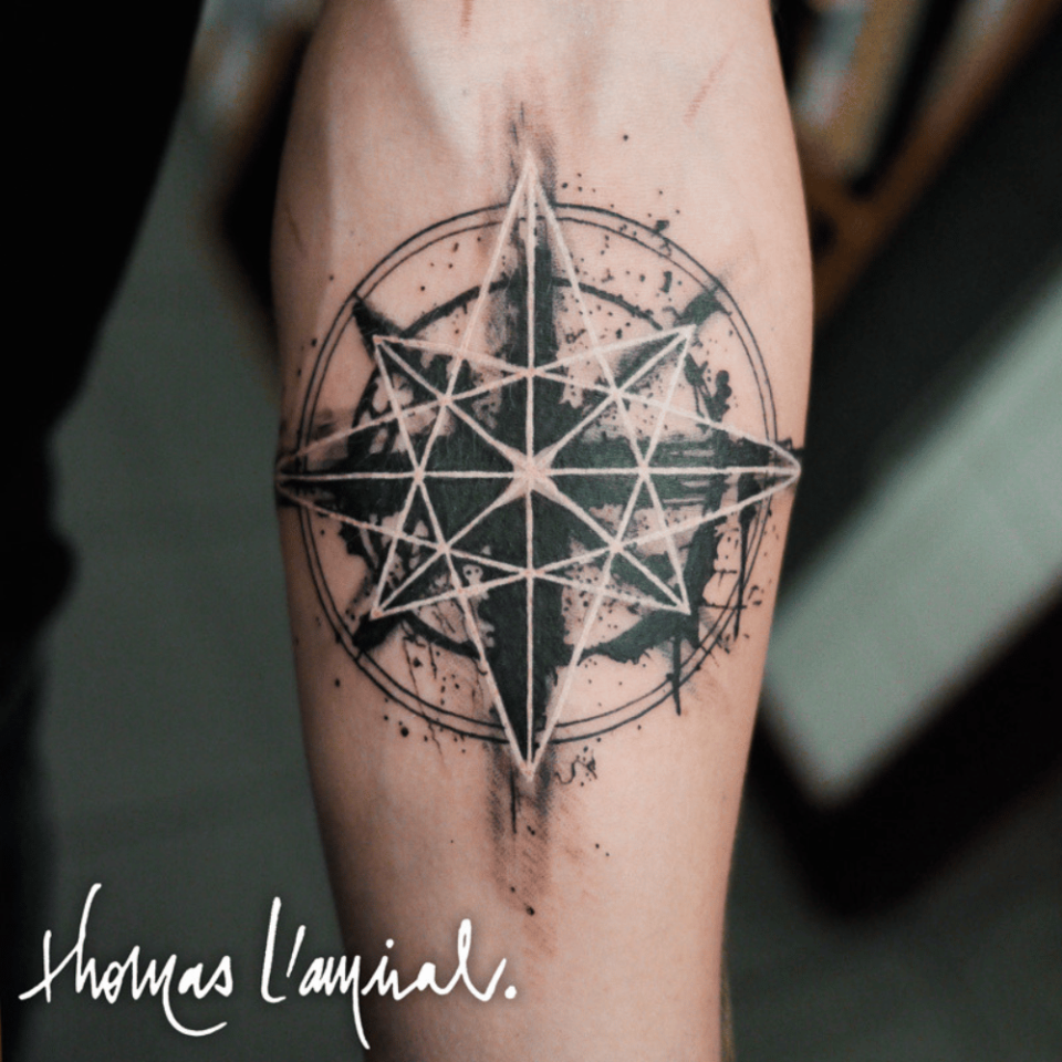star tattoo on arm