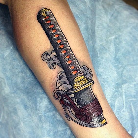 Samurai Sword with Ornate Hilt Realism Tattoo Source @tattooeasily via Pinterest