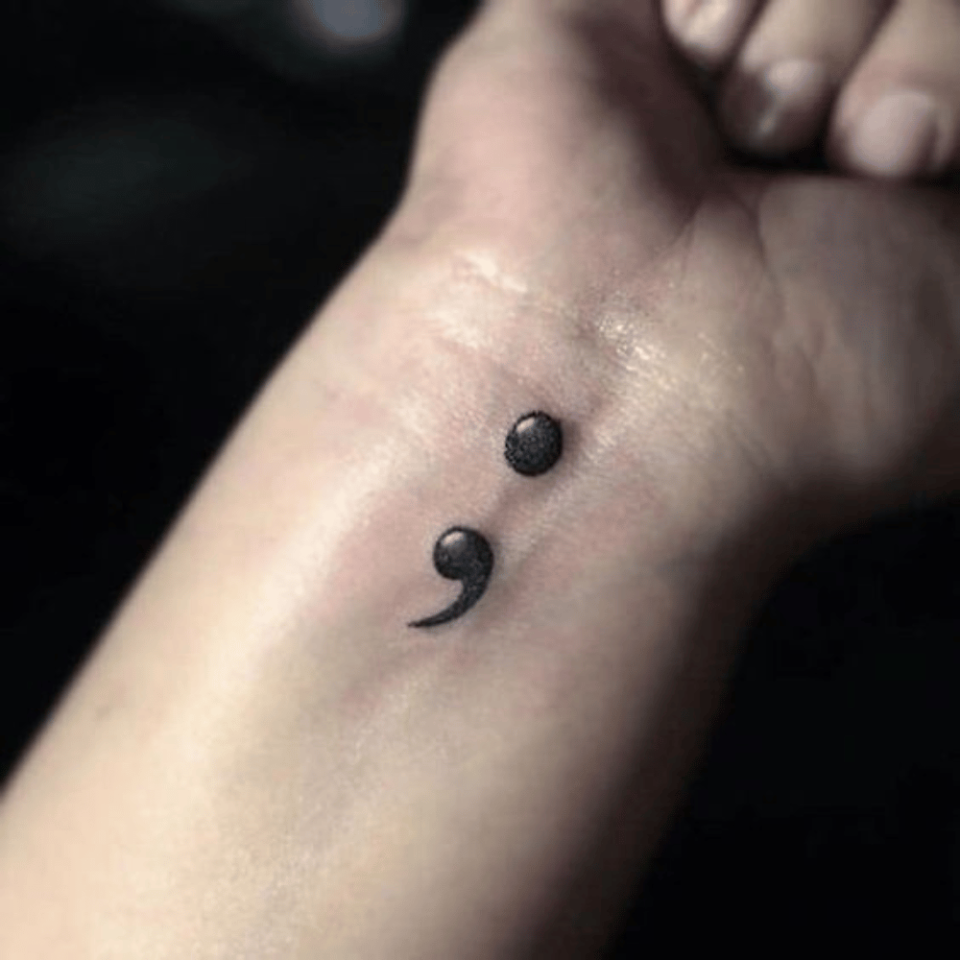 semicolon finger tattoo