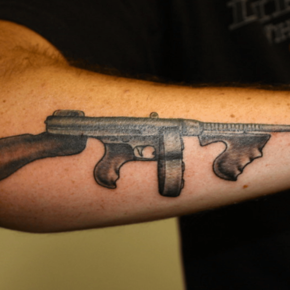 military machine gun tattoos
