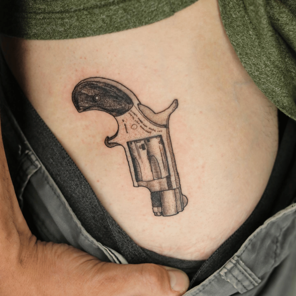 traditional revolver tattoo design