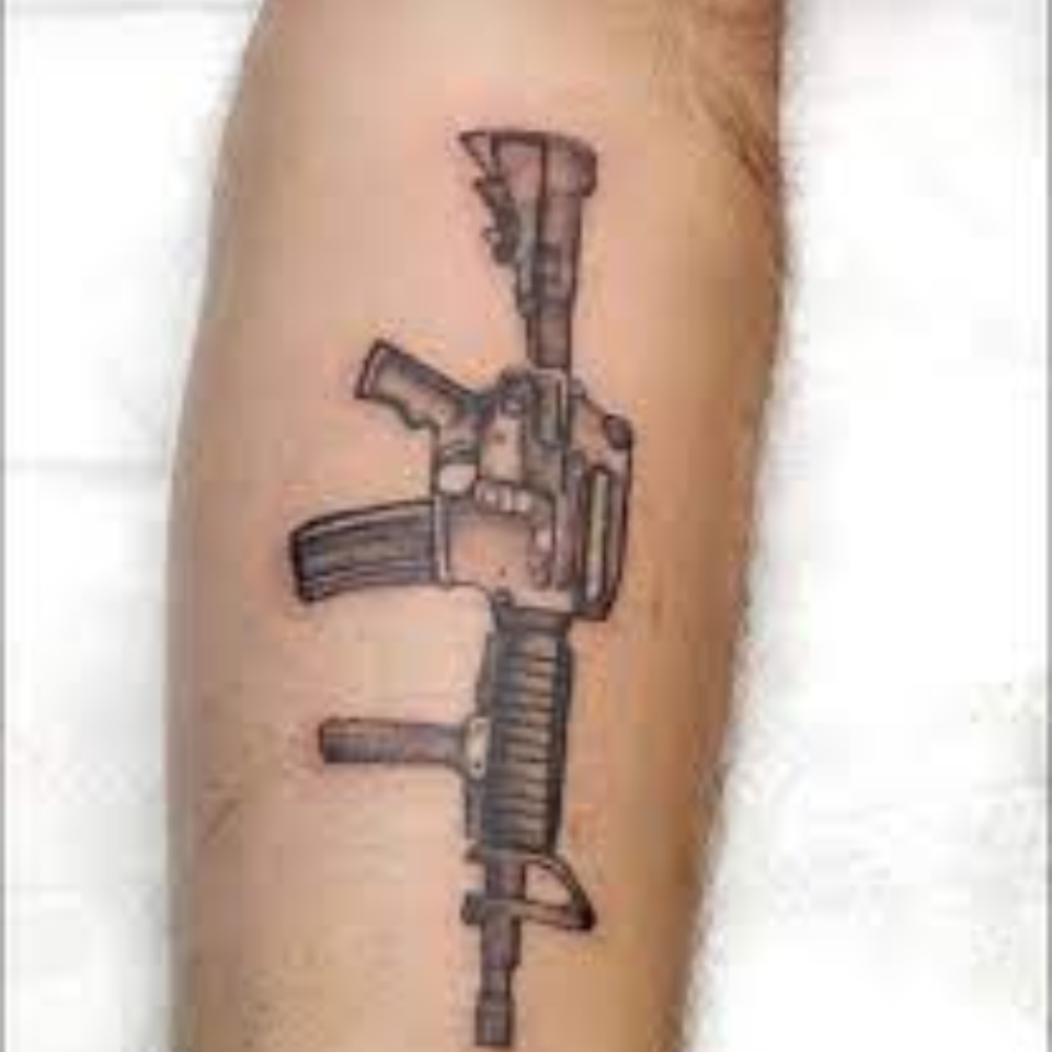 machine gun belt tattoo