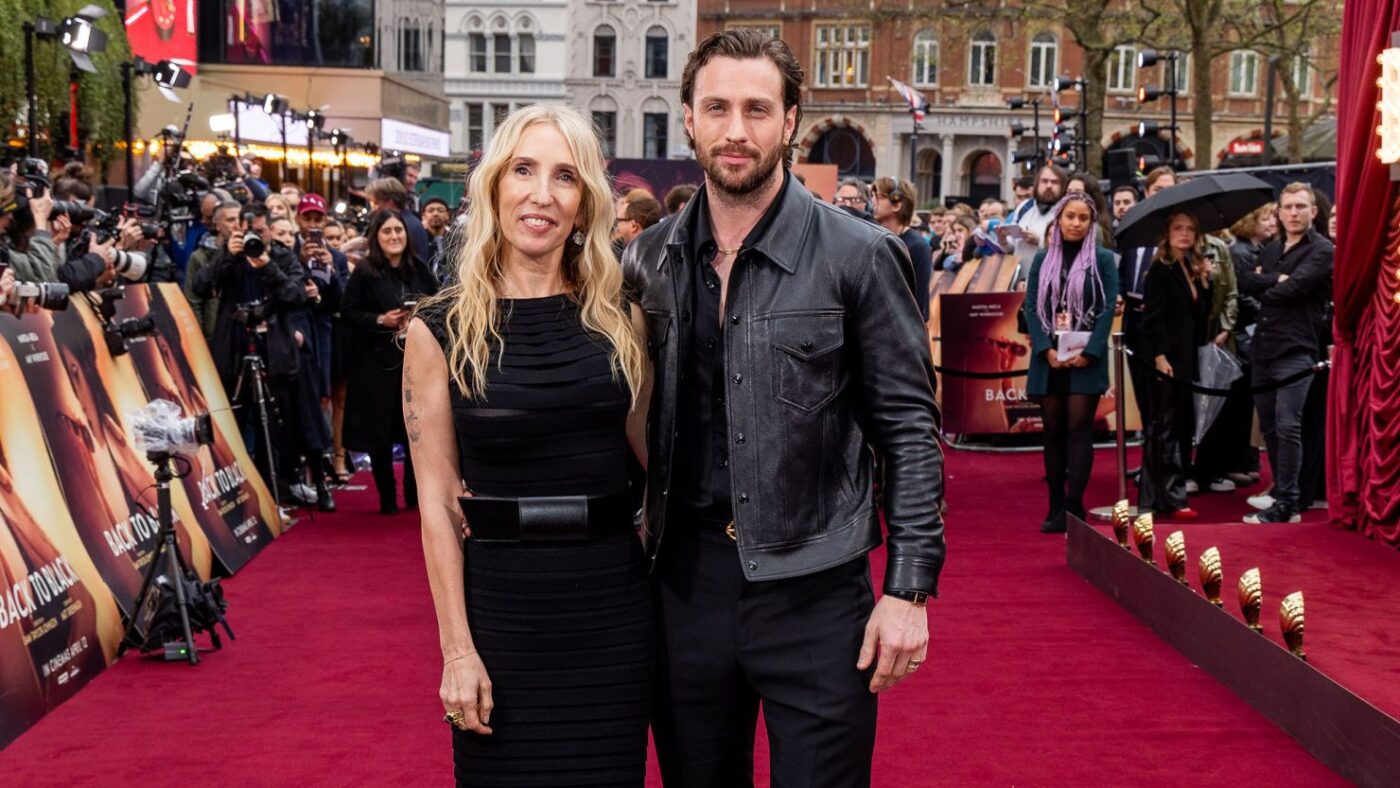 Aaron Taylor-Johnson arrives on the red carpet with his wife Sam Taylor-Johnson. 