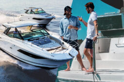 Two men relax on a luxury Sydney boat.