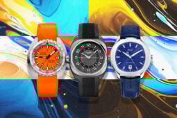 Three distinctive watches on a marbled background.