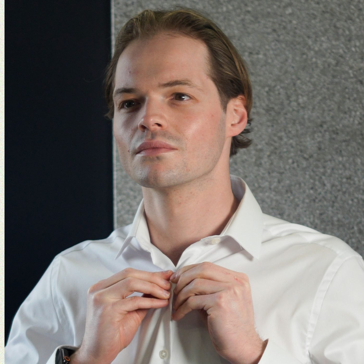 Man wearing Van Heusen Ultra Wrinkle-Free Shirt, styled for both office and evening wear.