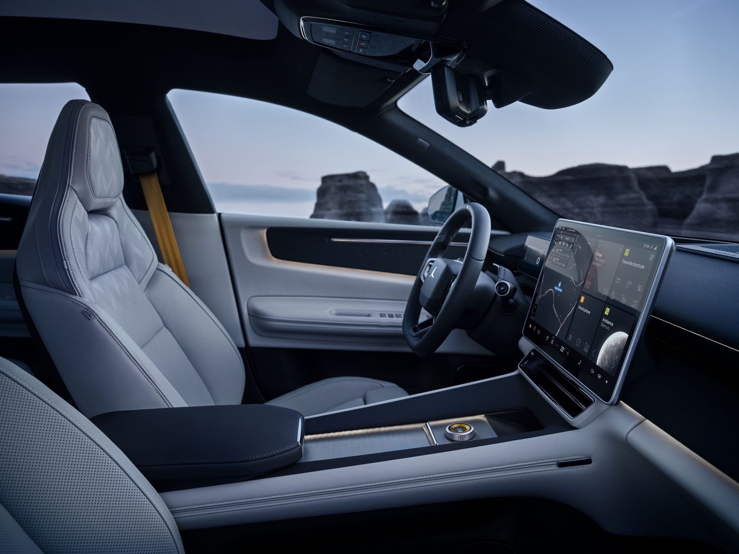 Interior of the 2027 Polestar 4 SUV showing the 15-inch touchscreen and light upholstery