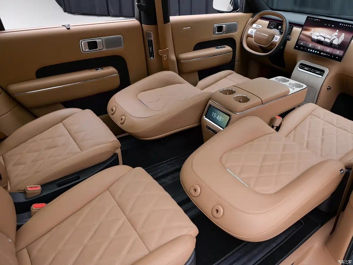 Interior of the Xiaomi Sky Nomad N90 showing captains chairs and dashboard screen