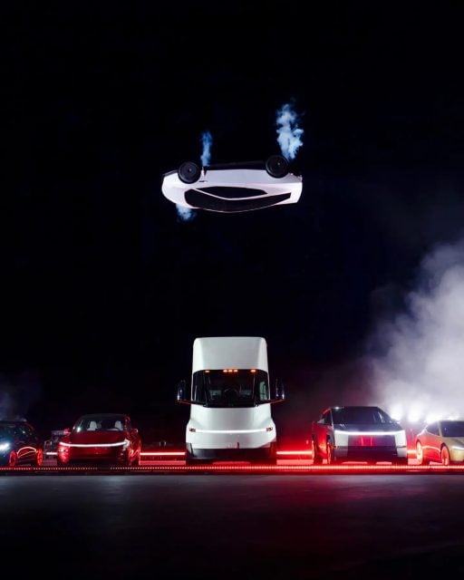 The new Tesla Roadster flying upside down above a Tesla Semi at its reveal in Texas